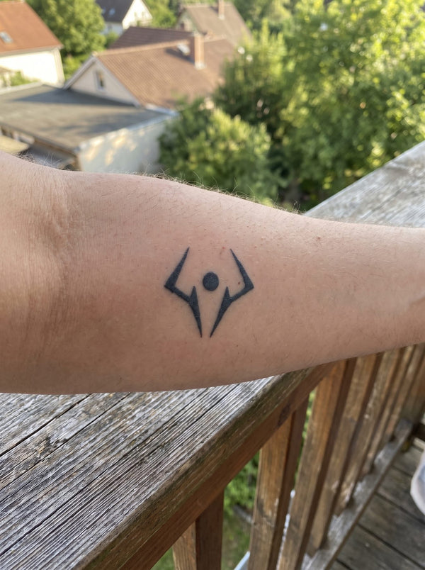 Sukuna Mark temporary tattoo shown on a forearm