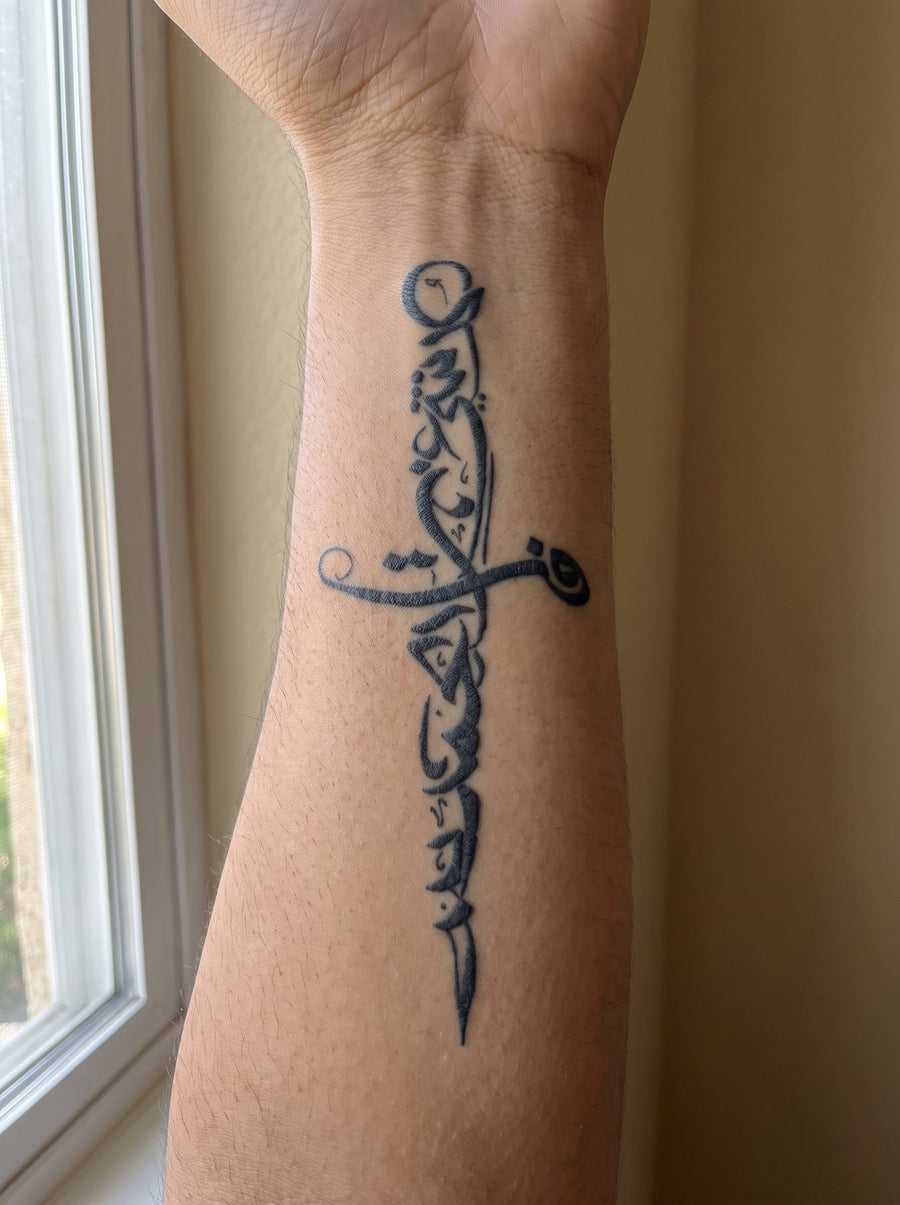 Dagger temporary tattoo shown on a forearm