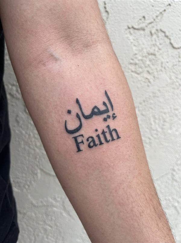 Faith temporary tattoo shown on a forearm