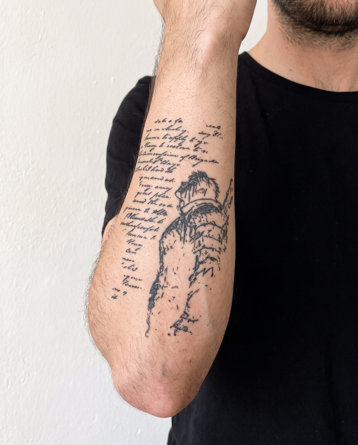 Black Swordsman Script semi-permanent tattoo on inner forearm
