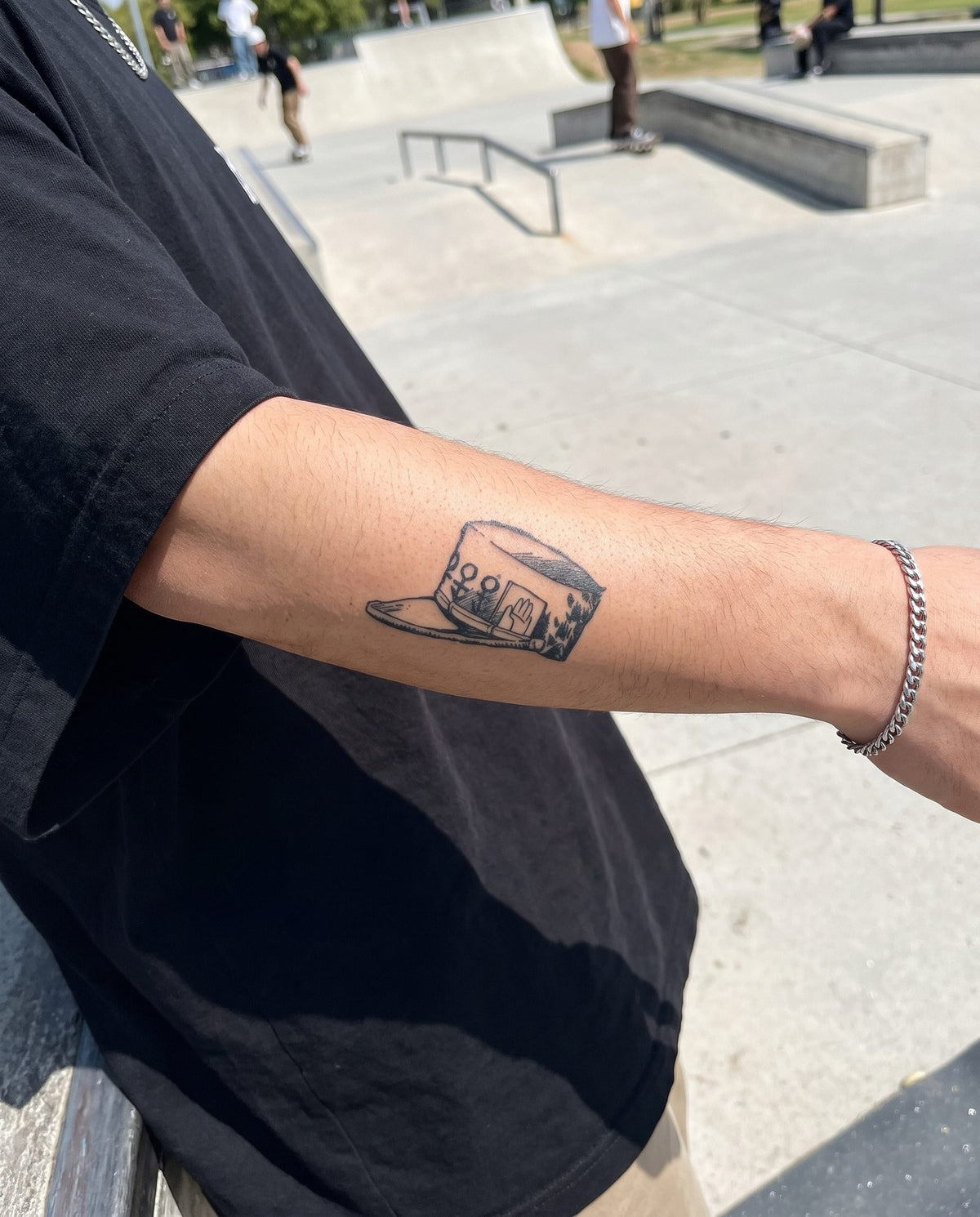 Jotaro's Cap semi-permanent tattoo on forearm
